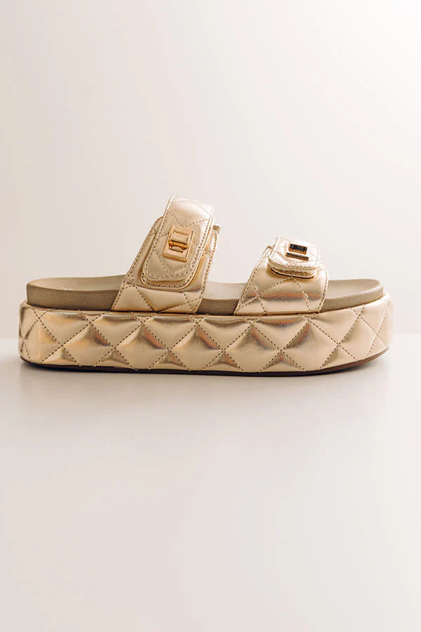 Onya Faux Leather Metallic Sandal in Gold
